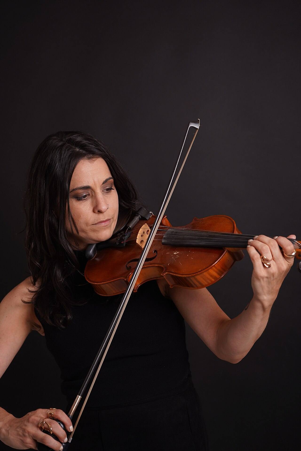 Lesley Ray, American violinist, entrepreneur, and founder of BrainHome, playing violin.
